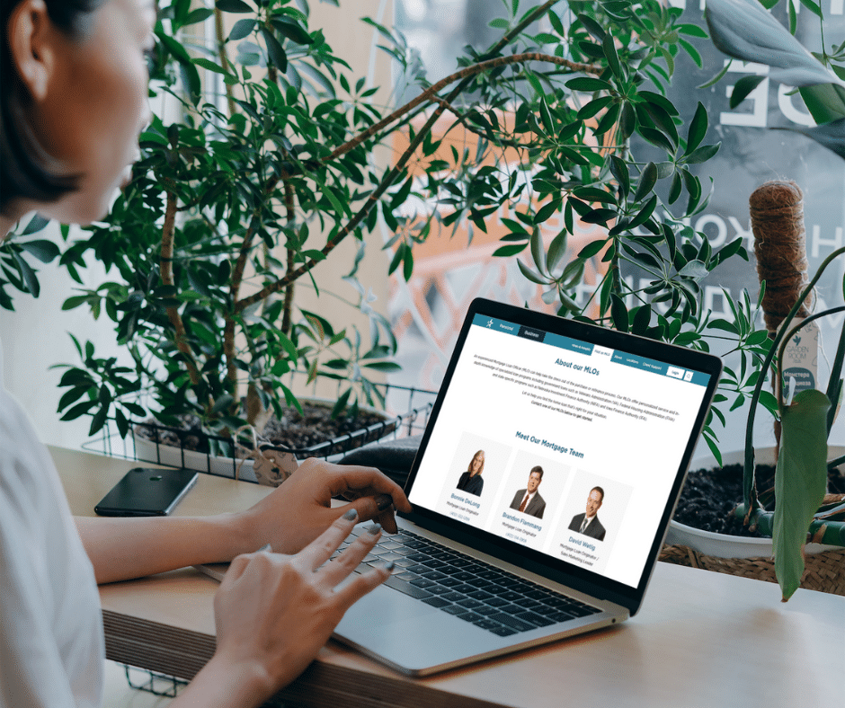 Women using computer searching mortgage loan officers